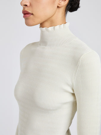 Proenza Schouler Detail image of model wearing Phyllis Turtleneck in Geo Knits in Off White