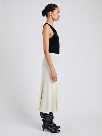 Proenza Schouler side image of model wearing Stina Skirt in Geo Knits in off white