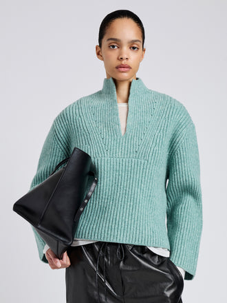 Proenza Schouler Front cropped image of model wearing Meron Sweater in Melange Merino in Sea Glass Melange