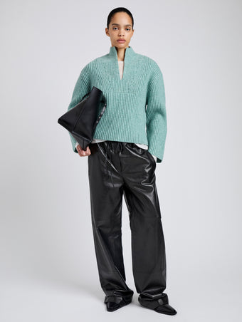 Proenza Schouler Front full length image of model wearing Meron Sweater in Melange Merino in Sea Glass Melange
