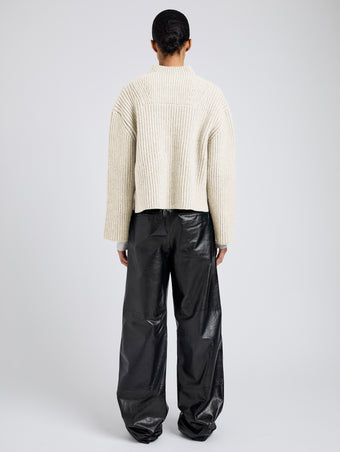 Proenza Schouler Back full length image of model wearing Meron Sweater in Melange Merino in Off White Melange