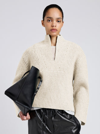 Proenza Schouler Front cropped image of model wearing Meron Sweater in Melange Merino in Off White Melange