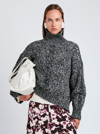 Proenza Schouler Front cropped image of model wearing Sol Sweater in Melange Alpaca in BlackWhite Melange