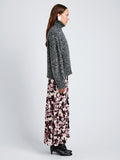Proenza Schouler Side full length image of model wearing Sol Sweater in Melange Alpaca in BlackWhite Melange