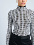Proenza Schouler Detail image of model wearing Zella Top in Check Merino in BlackJade