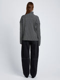 Proenza Schouler Back full length image of model wearing Elysia Sweater in Ladder Stripe Knits in BlackWhite