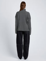Proenza Schouler Back full length image of model wearing Elysia Sweater in Ladder Stripe Knits in BlackWhite