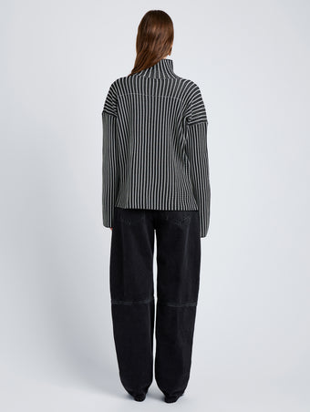 Proenza Schouler Back full length image of model wearing Elysia Sweater in Ladder Stripe Knits in BlackWhite