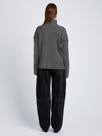Proenza Schouler Back full length image of model wearing Elysia Sweater in Ladder Stripe Knits in BlackWhite