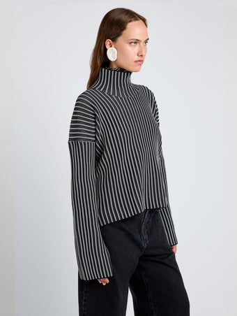 Proenza Schouler Detail image of model wearing Elysia Sweater in Ladder Stripe Knits in BlackWhite