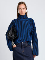 Proenza Schouler Front cropped image of model wearing Elysia Sweater in Ladder Stripe Knits in BlueBlack
