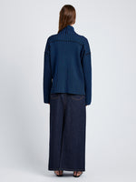 Proenza Schouler Back full length image of model wearing Elysia Sweater in Ladder Stripe Knits in BlueBlack