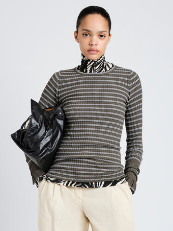 Proenza Schouler Front cropped image of model wearing Yasmine Sweater in Multi Stripe Knit in IvyWhite