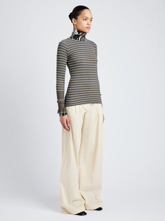 Proenza Schouler Side full length image of model wearing Yasmine Sweater in Multi Stripe Knit in IvyWhite