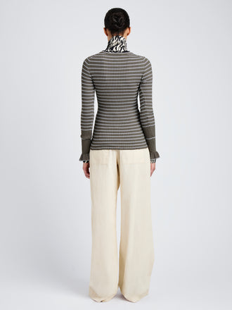 Proenza Schouler Back full length image of model wearing Yasmine Sweater in Multi Stripe Knit in IvyWhite