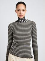 Proenza Schouler Detail image of model wearing Yasmine Sweater in Multi Stripe Knit in IvyWhite