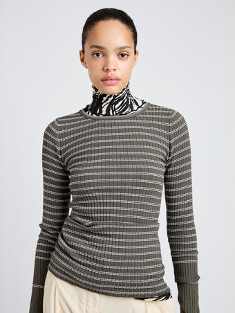 Proenza Schouler Detail image of model wearing Yasmine Sweater in Multi Stripe Knit in IvyWhite