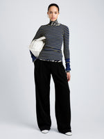 Proenza Schouler Front full length image of model wearing Yasmine Sweater in Multi Stripe Knit in NavyYellow