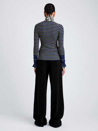 Proenza Schouler Back full length image of model wearing Yasmine Sweater in Multi Stripe Knit in NavyYellow