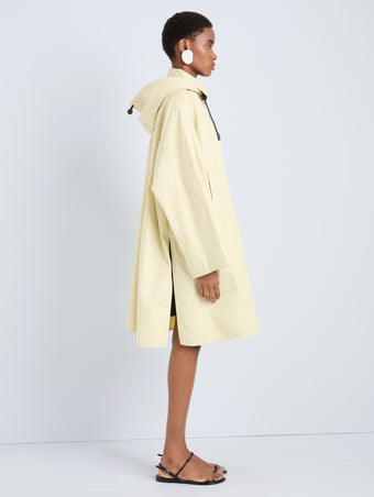 Proenza Schouler Side full length image of model wearing Camryn Trench in Outerwear Cotton in Straw