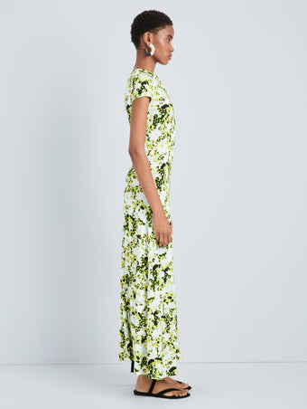 Proenza Schouler Side full length image of model wearing Noelani Dress in Soft Jersey in Straw Multi