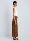 Proenza Schouler Side full length image of model wearing Nayah Skirt in Textured Suede in Tobacco