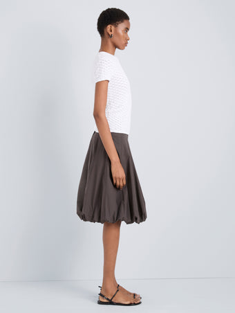 Proenza Schouler Side full length image of model wearing Kyra Skirt in Rumpled Cotton in Coffee