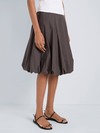 Proenza Schouler Detail image of model wearing Kyra Skirt in Rumpled Cotton in Coffee