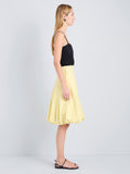 Proenza Schouler Side full length image of model wearing Kyra Skirt in Rumpled Cotton in Straw