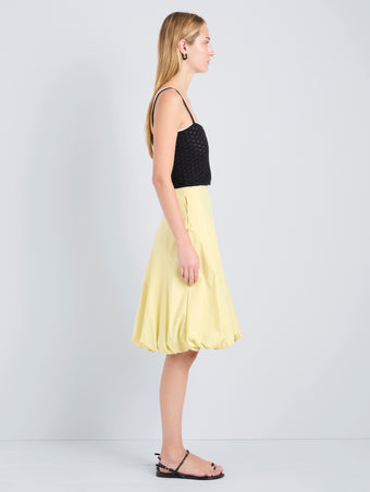 Proenza Schouler Side full length image of model wearing Kyra Skirt in Rumpled Cotton in Straw