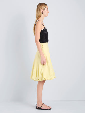 Proenza Schouler Side full length image of model wearing Kyra Skirt in Rumpled Cotton in Straw