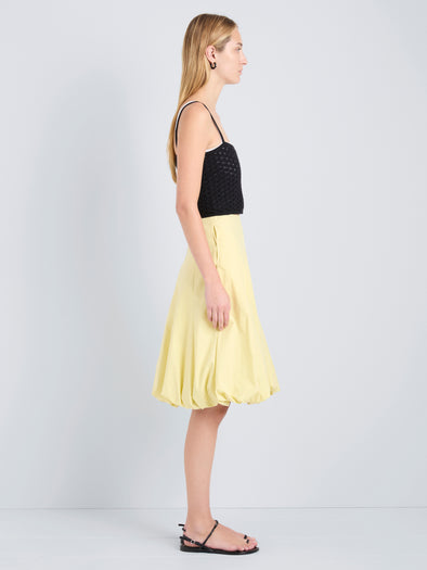 Proenza Schouler Side full length image of model wearing Kyra Skirt in Rumpled Cotton in Straw