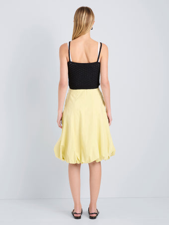 Proenza Schouler Back full length image of model wearing Kyra Skirt in Rumpled Cotton in Straw