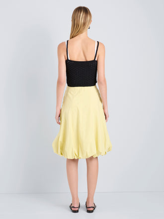 Proenza Schouler Back full length image of model wearing Kyra Skirt in Rumpled Cotton in Straw