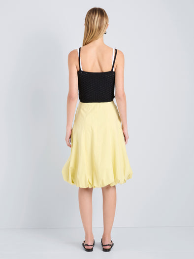 Proenza Schouler Back full length image of model wearing Kyra Skirt in Rumpled Cotton in Straw