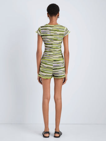 Proenza Schouler Back full length image of model wearing Veya Knit Tee in Linen Dry Rib in Apple Multi