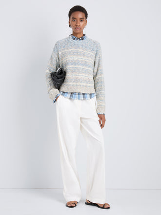 Proenza Schouler Front full length image of model wearing Ivara Sweater in Space Dye in HazeOff White