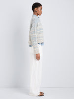 Proenza Schouler Side full length image of model wearing Ivara Sweater in Space Dye in HazeOff White