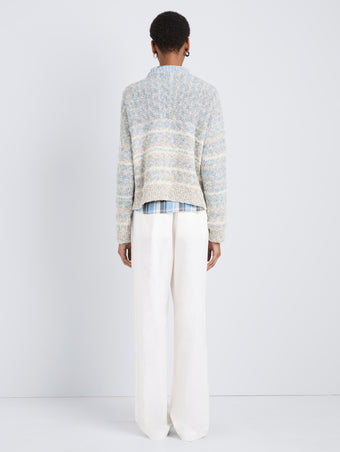Proenza Schouler Back full length image of model wearing Ivara Sweater in Space Dye in HazeOff White