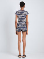 Proenza Schouler Back full length image of model wearing Jenna Knit Shorts in Linen Dry Rib in Navy Multi