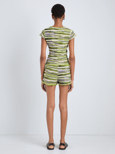 Proenza Schouler Back full length image of model wearing Jenna Knit Shorts in Linen Dry Rib in Apple Multi