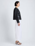 Proenza Schouler Side full length image of model wearing Robin Jacket in Leather in Black