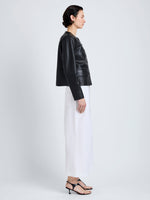 Proenza Schouler Side full length image of model wearing Robin Jacket in Leather in Black