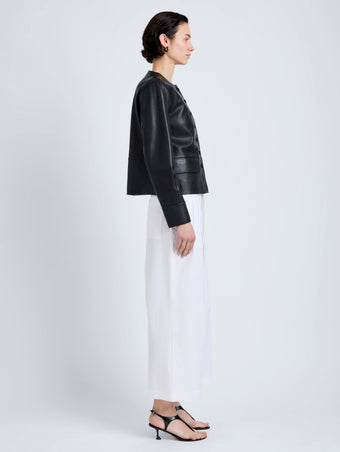 Proenza Schouler Side full length image of model wearing Robin Jacket in Leather in Black
