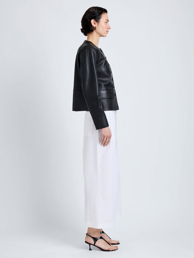 Proenza Schouler Side full length image of model wearing Robin Jacket in Leather in Black