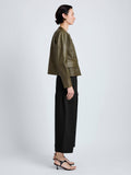 Proenza Schouler Side full length image of model wearing Robin Jacket in Leather in Fatigue