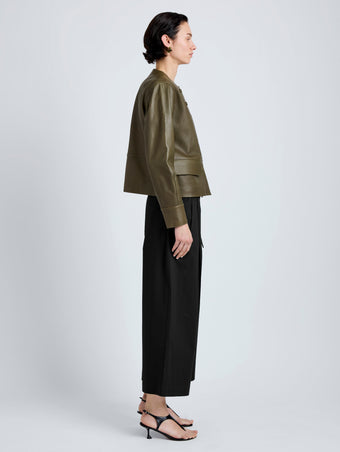 Proenza Schouler Side full length image of model wearing Robin Jacket in Leather in Fatigue