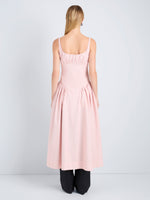 Proenza Schouler Back full length image of model wearing Solira Dress in Seersucker in Rust Off White