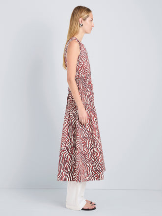 Proenza Schouler Side full length image of model wearing Loren Dress in Poplin in Rust Cream Multi