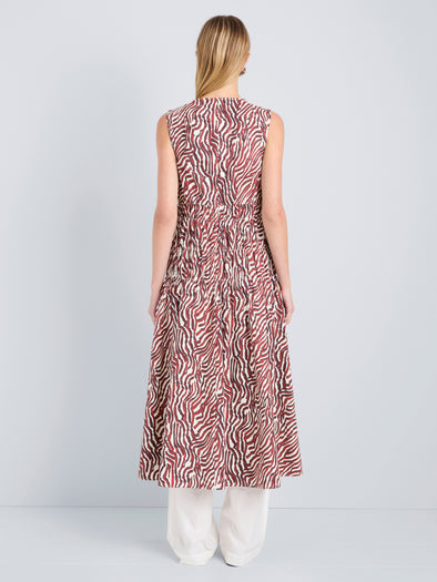 Proenza Schouler Back full length image of model wearing Loren Dress in Poplin in Rust Cream Multi